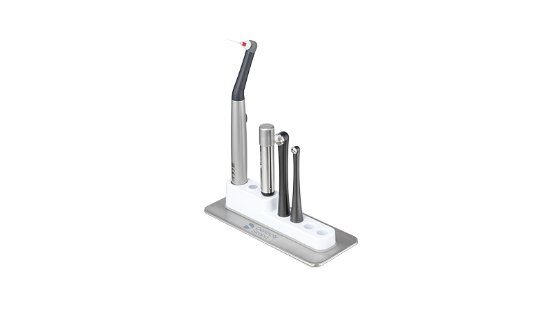 SmartLite Pro Family on charging base, including the curing light tip and the transillumination tip